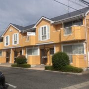 スーパーウレアコートでオレンジ色に塗り替えた外壁塗装の施工事例写真